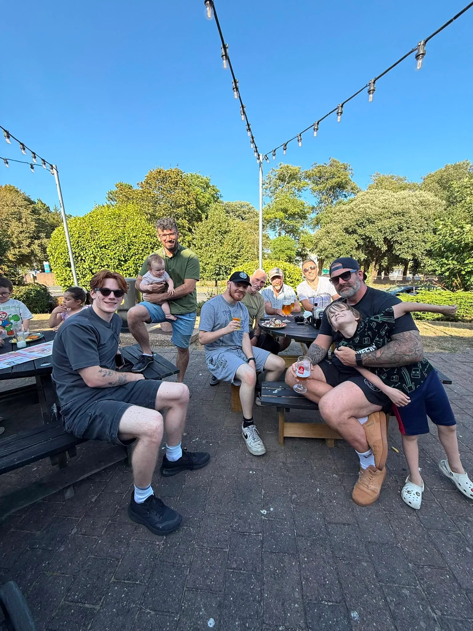 Rebel members and their families at the pub after the Sunday open mat