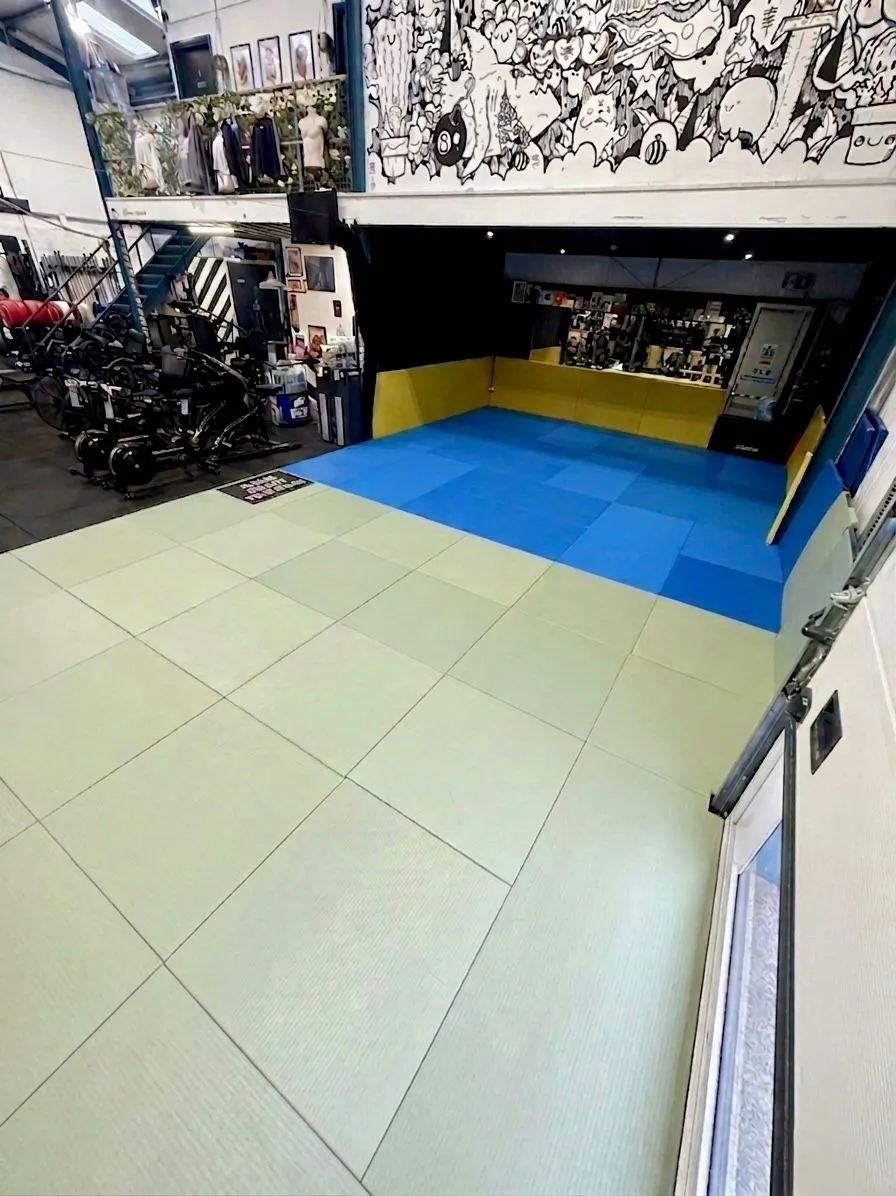 The matted training area and gym at Rebel Combat Sports in Eastbourne