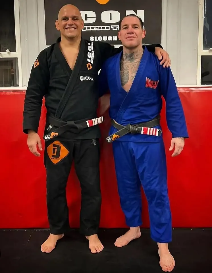 Tolly Plested and Ze Marcello at Icon Jiu Jitsu Team Slough, both wearing black belts